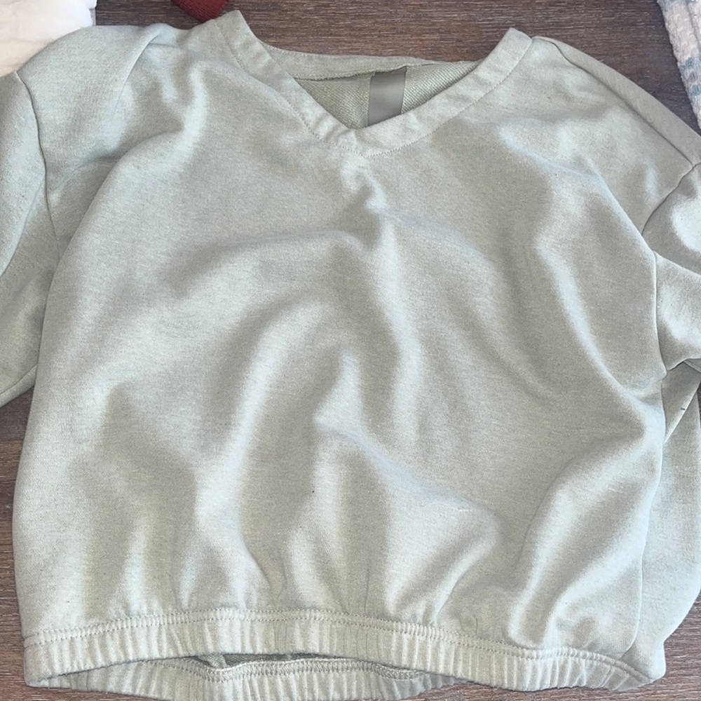 green sweater